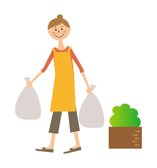 A woman carrying two trash bags A woman carrying two trash bags