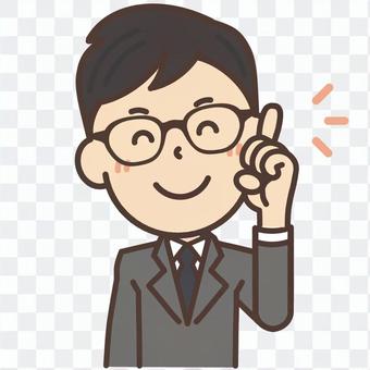 A man with glasses eyed glasses that teaches points with a smile A man with glasses eyed glasses that teaches points with a smile