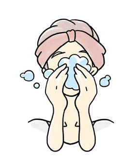 Adult girls washing their face with plenty of foam Adult girls washing their face with plenty of foam
