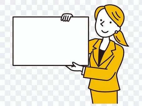 Woman holding a whiteboard next to her Woman holding a whiteboard next to her