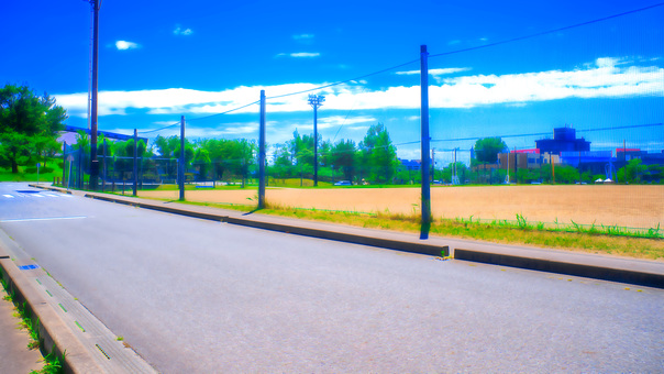 Road and baseball field Road and baseball field