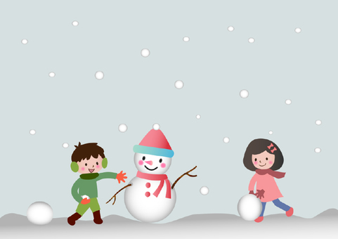 A child making a snowman A child making a snowman