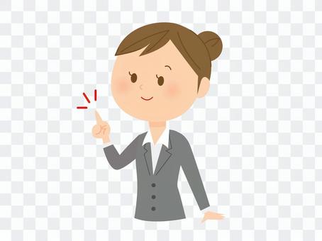 A woman with a suit pointing her finger A woman with a suit pointing her finger
