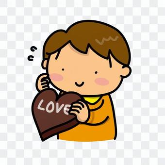 A boy shining with chocolate A boy shining with chocolate
