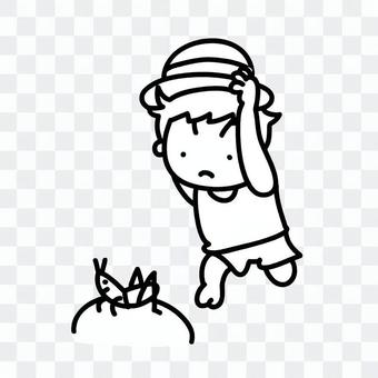 A boy trying to grab a grasshopper A boy trying to grab a grasshopper