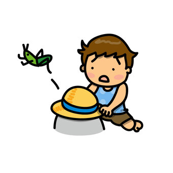 A boy trying to grab a grasshopper A boy trying to grab a grasshopper